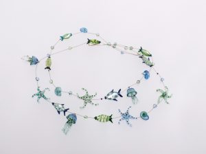 Meeresgetier transparent / 2 Str., Glas Stahlseil Silber / 1601033-21